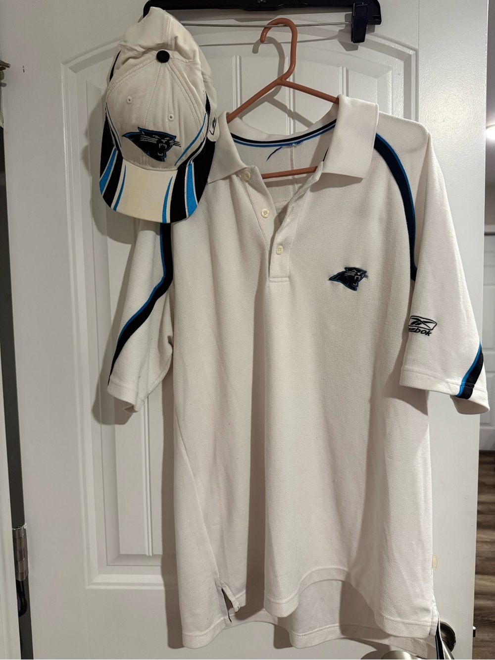 NFL White Polo Shirt with Blue and Black accents measures large pit to pit 43